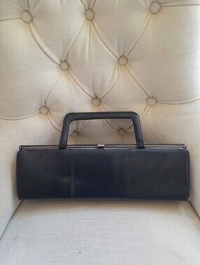 Vintage Waldman Navyk eather purse with gold lock closure.
